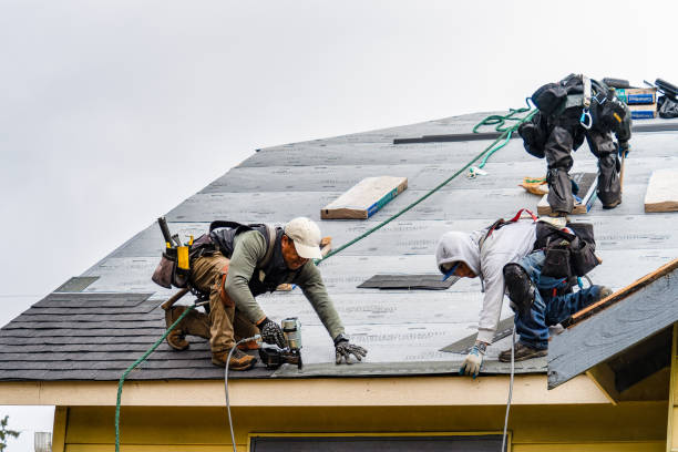 Professional Gutter Installation technician working in Temple City, CA